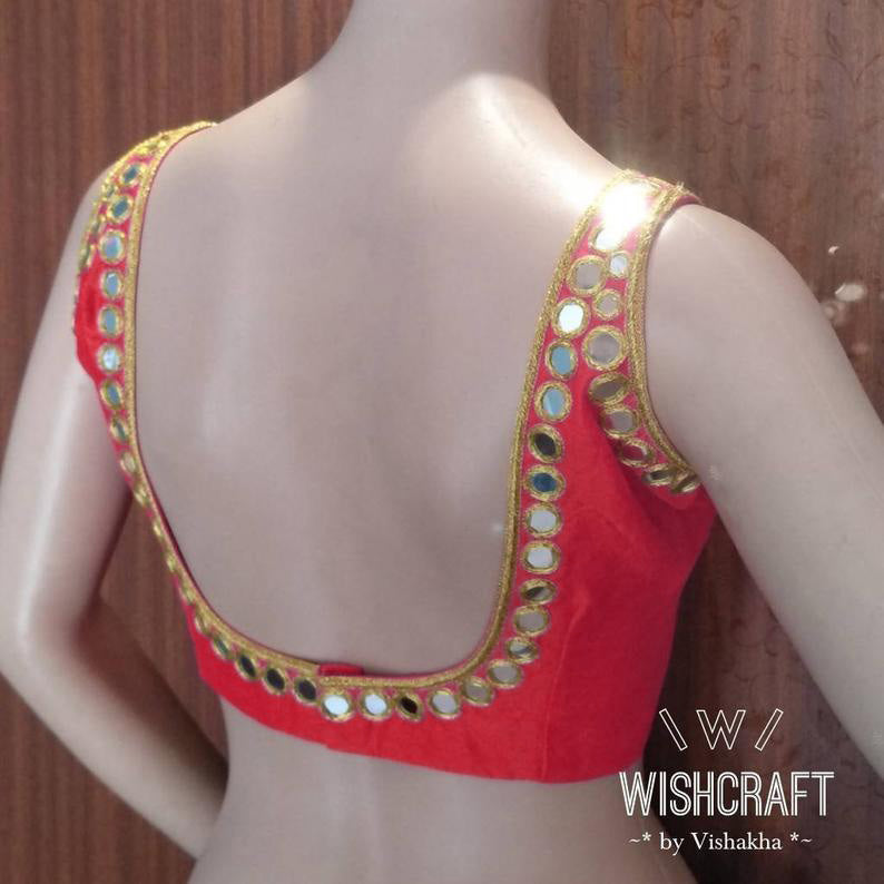 red backless blouse