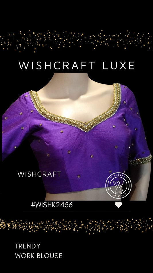 designer saree blouse with beautiful work on neckline and sleeves